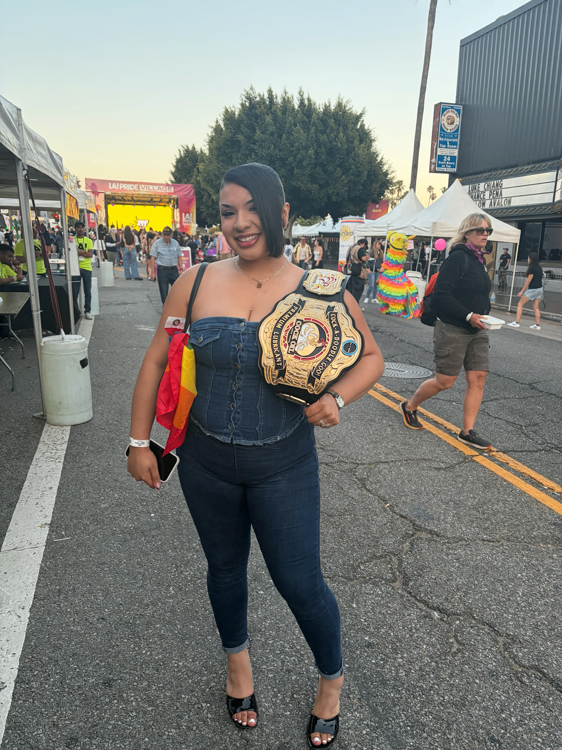 Cock Oil championship belt portrait at LA Pride